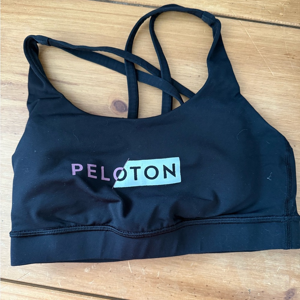 Peloton Black Sports Bra with Racerback Design and Moisture-Wicking Fabric